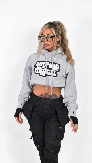 Model wearing the grey Roofing Cartel Street Hoodie with the Roofing Cartel logo across the chest
